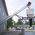 CDM Systems inclined En-Masse Drag Conveyor installation for ash handling.
