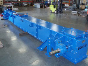 CDM Systems ceramic-lined En-Masse Drag Chain Conveyor for abrasive material conveying.